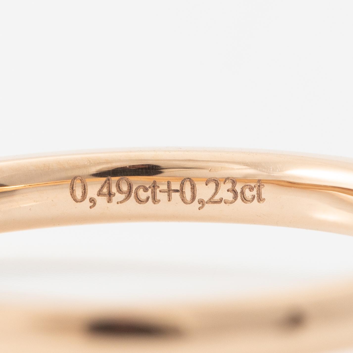 Ring 18K guld med briljantslipad diamant. Medföljande IGI report.