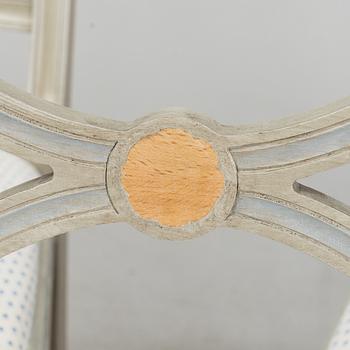 A dining table and six chairs, Gustavian style, second half of the 20th century. One leaf included.
