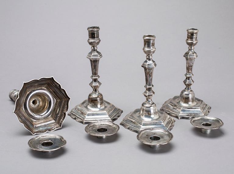 Two simular pairs of candlesticks, two marked Barde, Geneve 18th century, two with later marks.