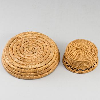 Two Sami root baskets, one signed.