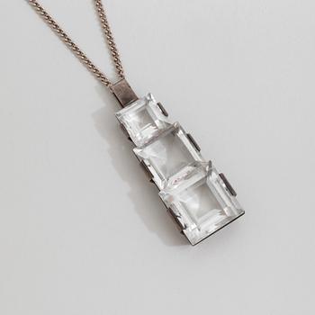 A rock crystal pendant by Stigbert, Stockholm, 1944.