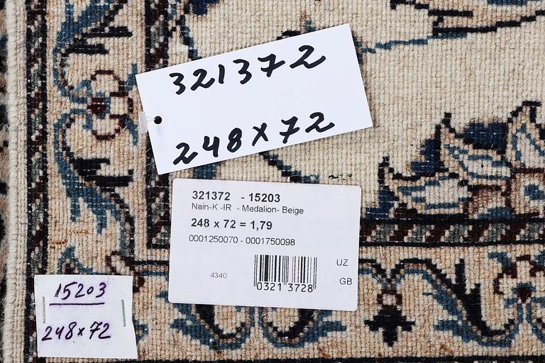 A runner carpet, Nain, part silk, ca 248 x 72 cm.