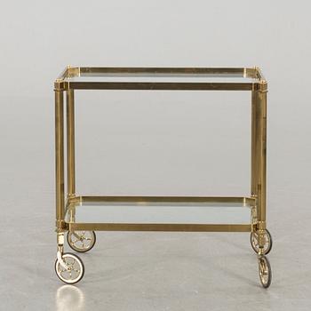 A BRASS SERVING TROLLEY.