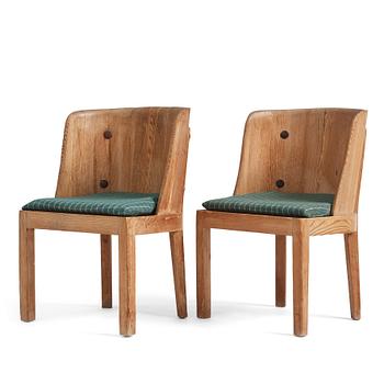 Axel Einar Hjorth, a pair of "Lovö" stained pine chairs, Nordiska Kompaniet, 1930s.