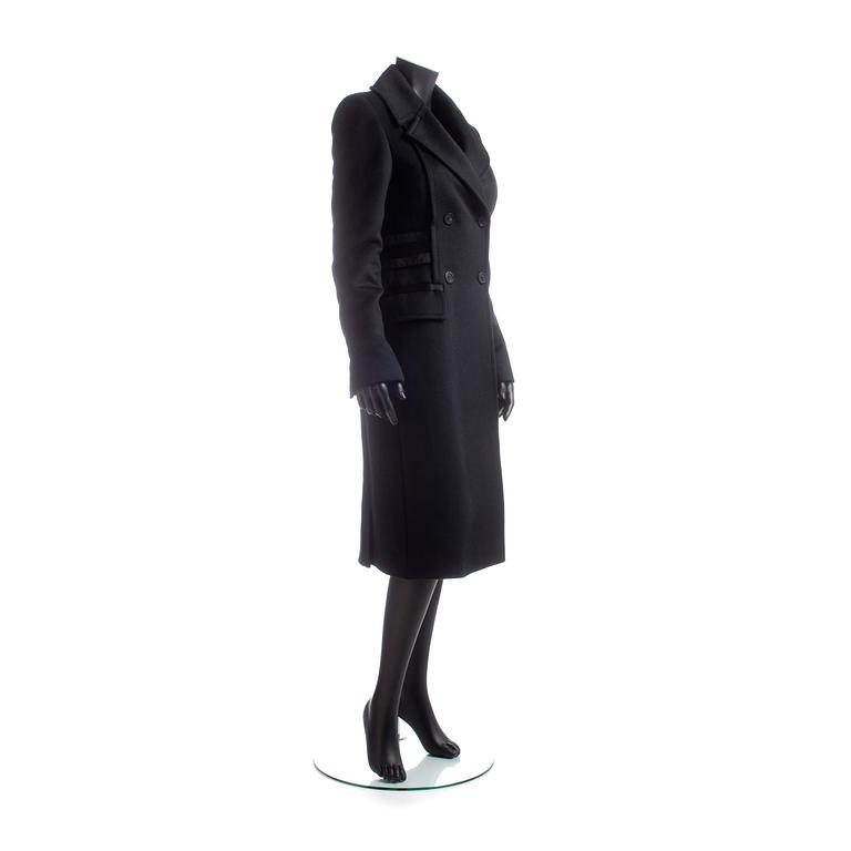GUCCI, a black wool blend coat.