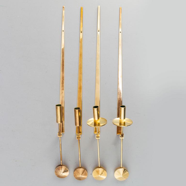 A set of four wall sconces by Pierre Forsell, Skultuna.