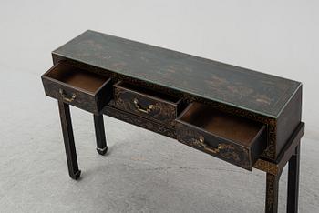 A Chinese black and gilt lacquered cupboard, 20th century.