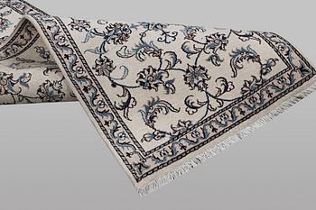 A runner carpet, Nain, part silk, ca 192 x 80 cm.