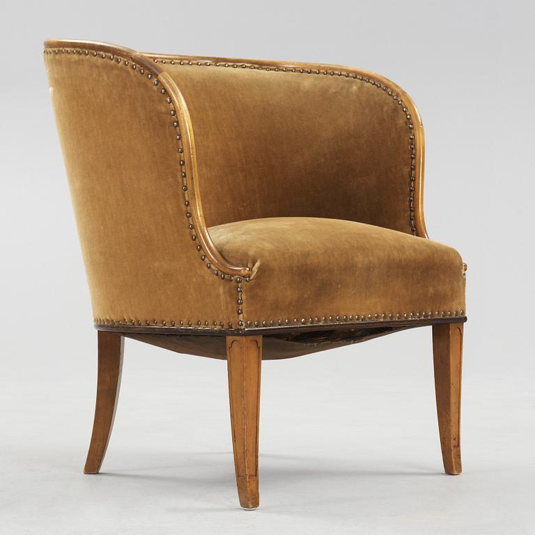 A Swedish Grace elm armchair, 'Bellman', attributed to Axel Einar Hjorth, Nordiska Kompaniet 1930.