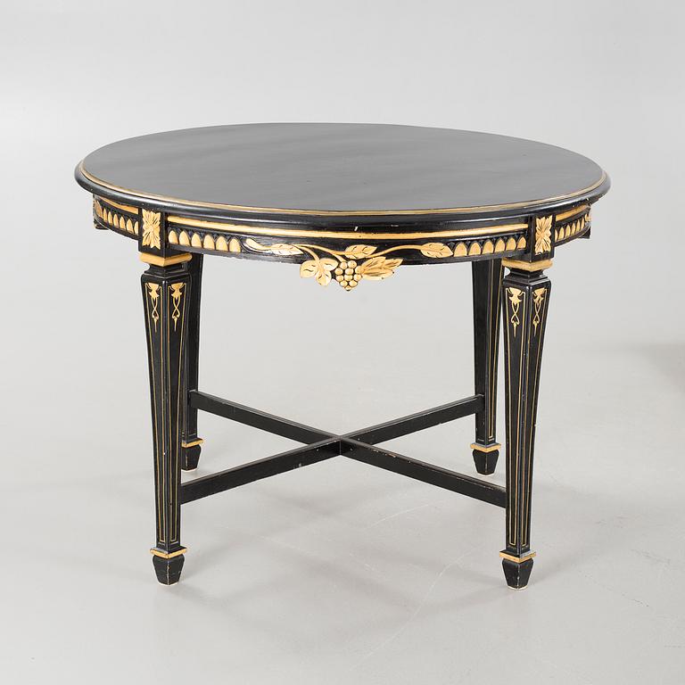 A gustavian style table and sofa, around the year 1900.