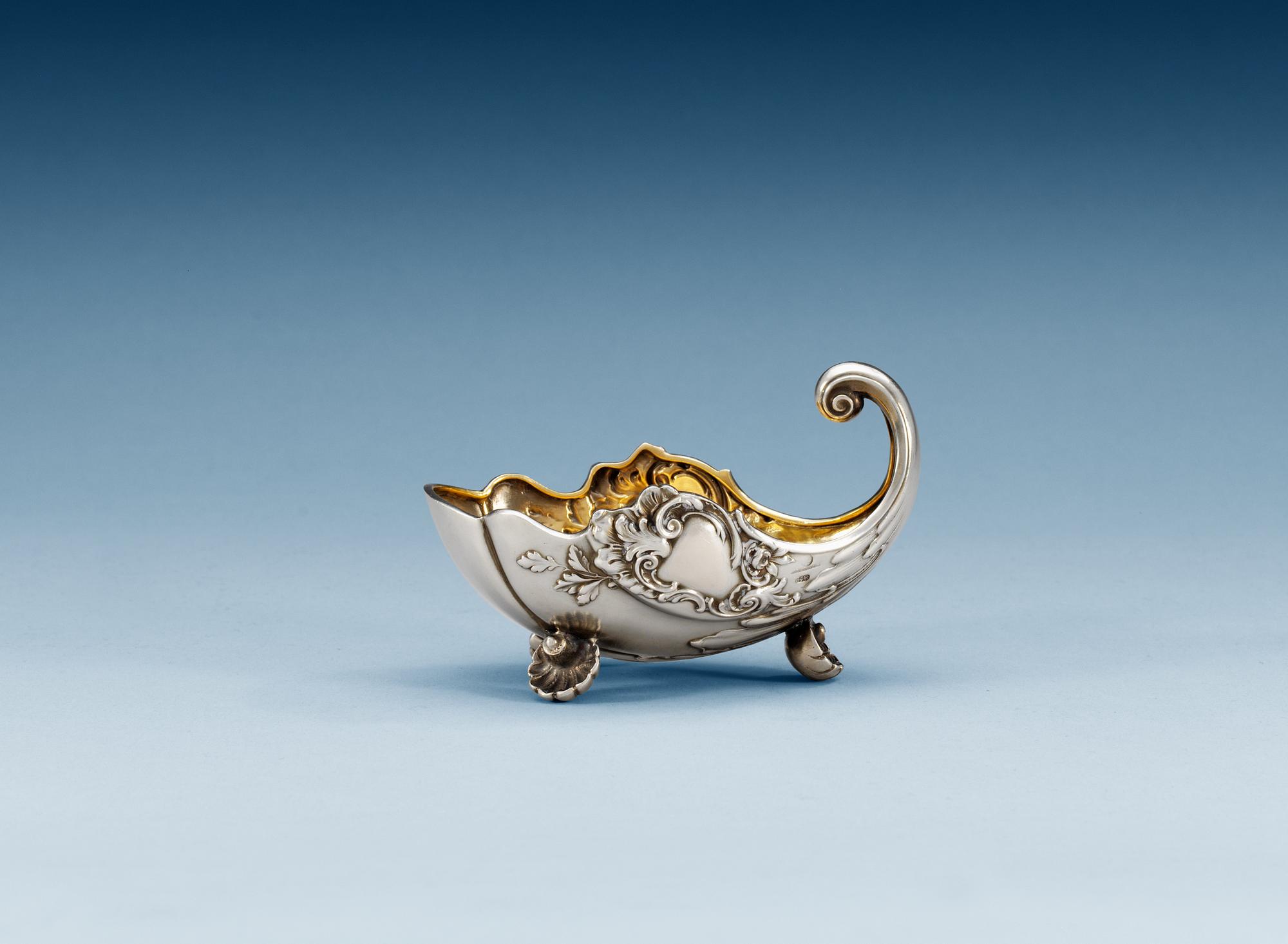 A RUSSIAN PARCEL-GILT KOVSH/CREAM-JUG, Makers mark of Pavel Ovchinnikov, St. Petersburg late 19th century.