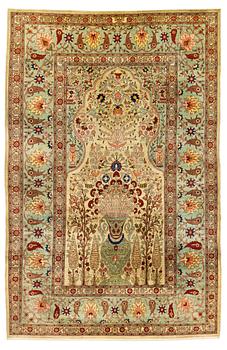 A rug, semi-antique, silke Hereke, ca 185 x 122 cm.