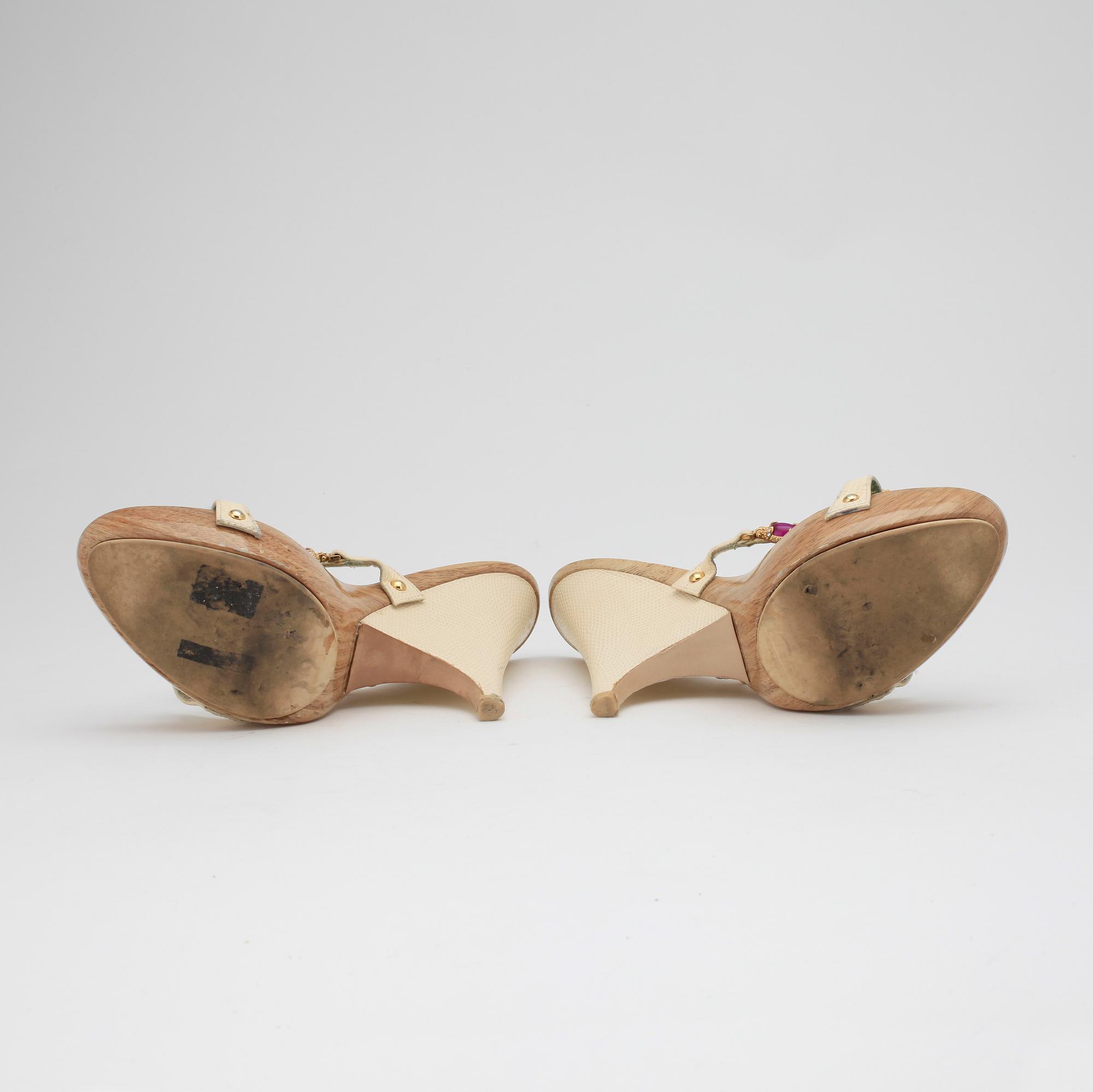 GIUSEPPE ZANOTTI, a pair of wedge heeled sandalettes with paste.