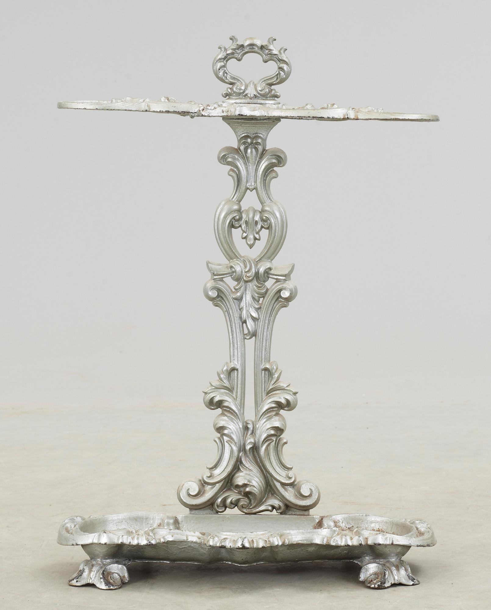 PARAPLYSTÄLL, gjutjärn, 1900-talets första hälft.
