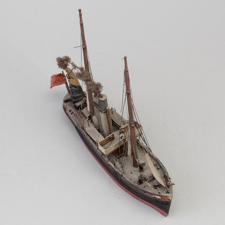 A 20th century wooden model of a steam engine boat.