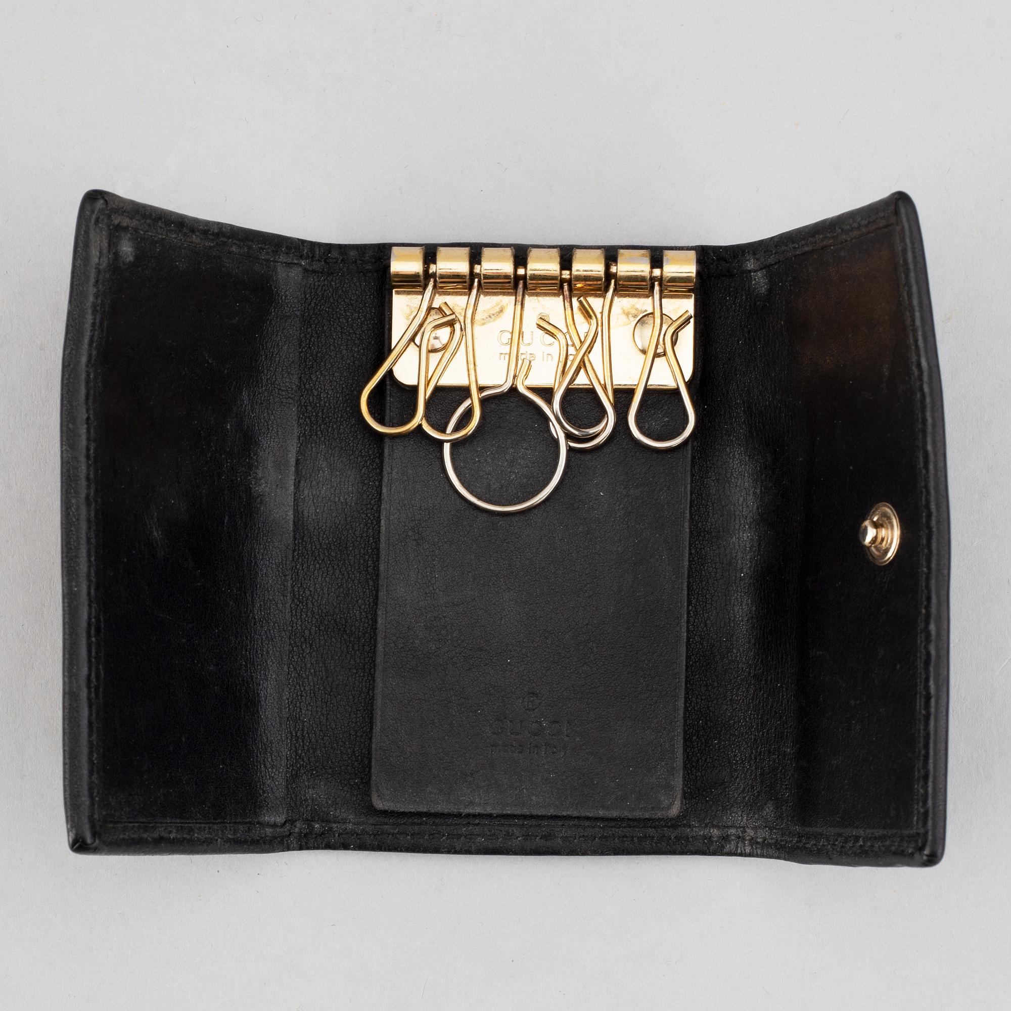 Gucci, ipad-case, key-case and mobile-case.