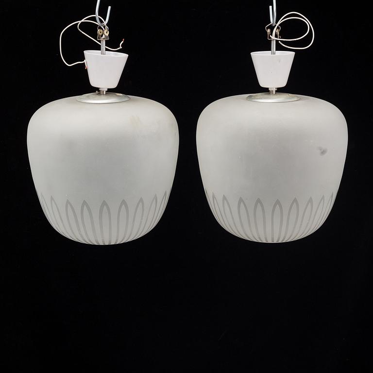 A pair of 1940's Swedish medern ceiling lamps.