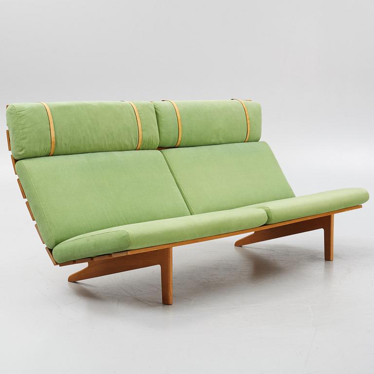 A sofa with a stool, Erik Jørgensen Møbelfabrik, Denmark.