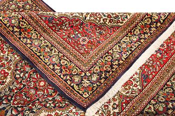 A Ghom rug, c. 202 x 137 cm.