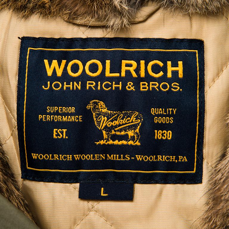 Ladies Woolrich Military Parka in size L.