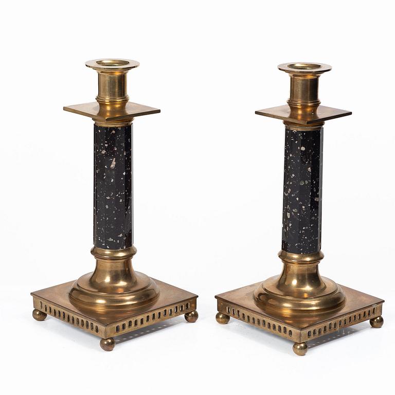 A pair of candlesticks brass and porphyry, EOS Jönköping, 20th century.