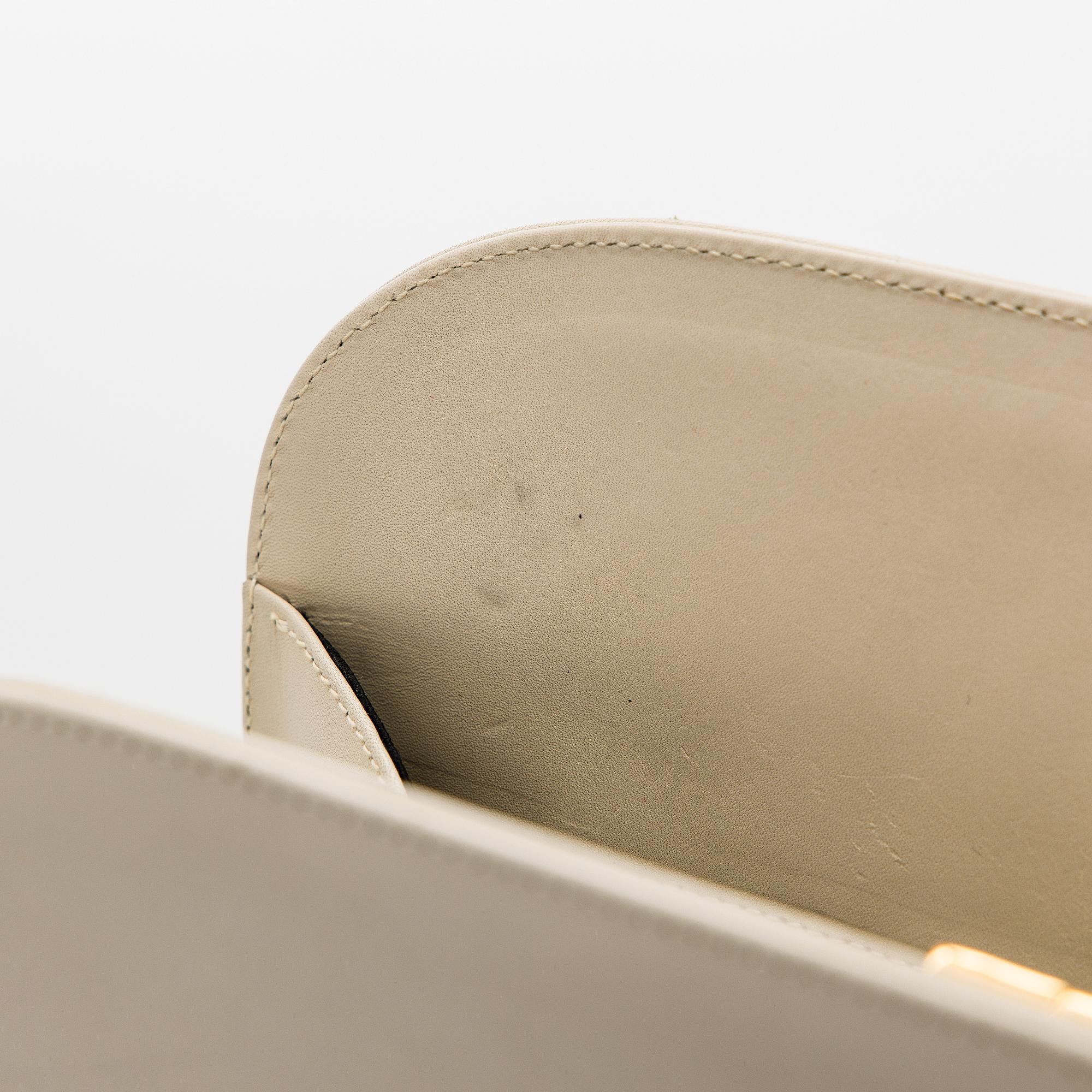 Salvatore Ferragamo, a leather “Gancini”bag.