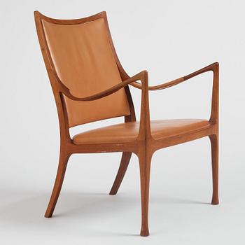 Hans Asplund, a walnut and leather easy chair, Nordiska Kompaniet, ca 1955, for the Nordiska Kompaniet beauty salon.