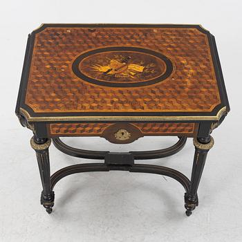 A Louis XVI style table, second half of the 19th century.