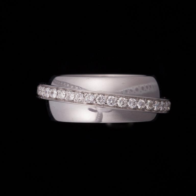 Piaget, SORMUS, 18K valkokultaa, timanteja. Piaget. Paino n. 16,9 g.