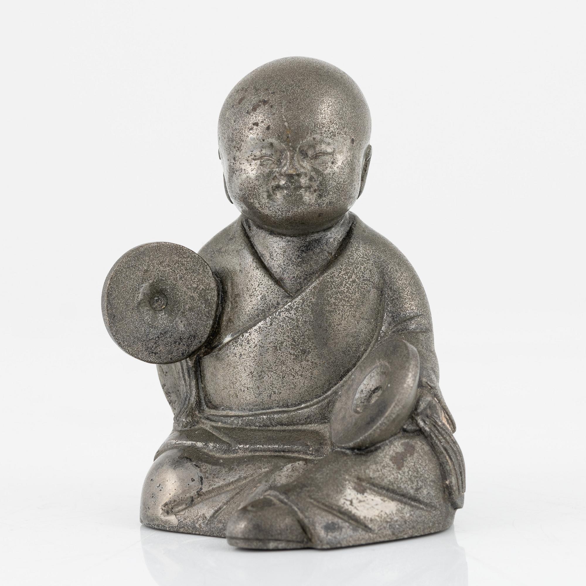 A pewter figurine, China, late Qign Dynasty, around 1900.