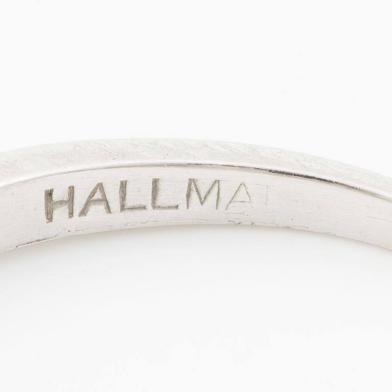 Platinum ring with baguette-cut diamonds.