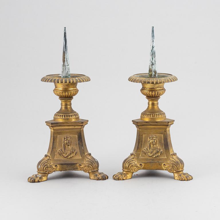 A pair of candlesticks from the 19th century.