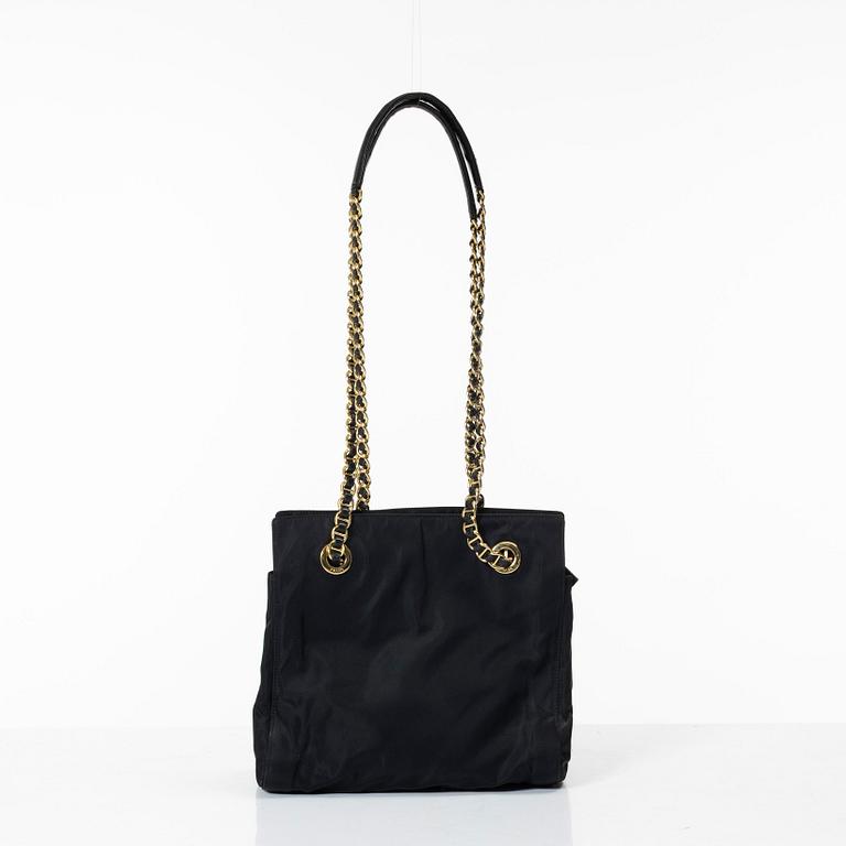 Prada, A black nylon bag.