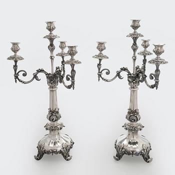 A pair of silver candelabra, maker marks of Carl Johan Tegelsten, Saint Petersburg 1850.