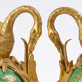A pair of Louis XV-style gilt bronze and porcelain decorative ewers, France, later part 19th century.