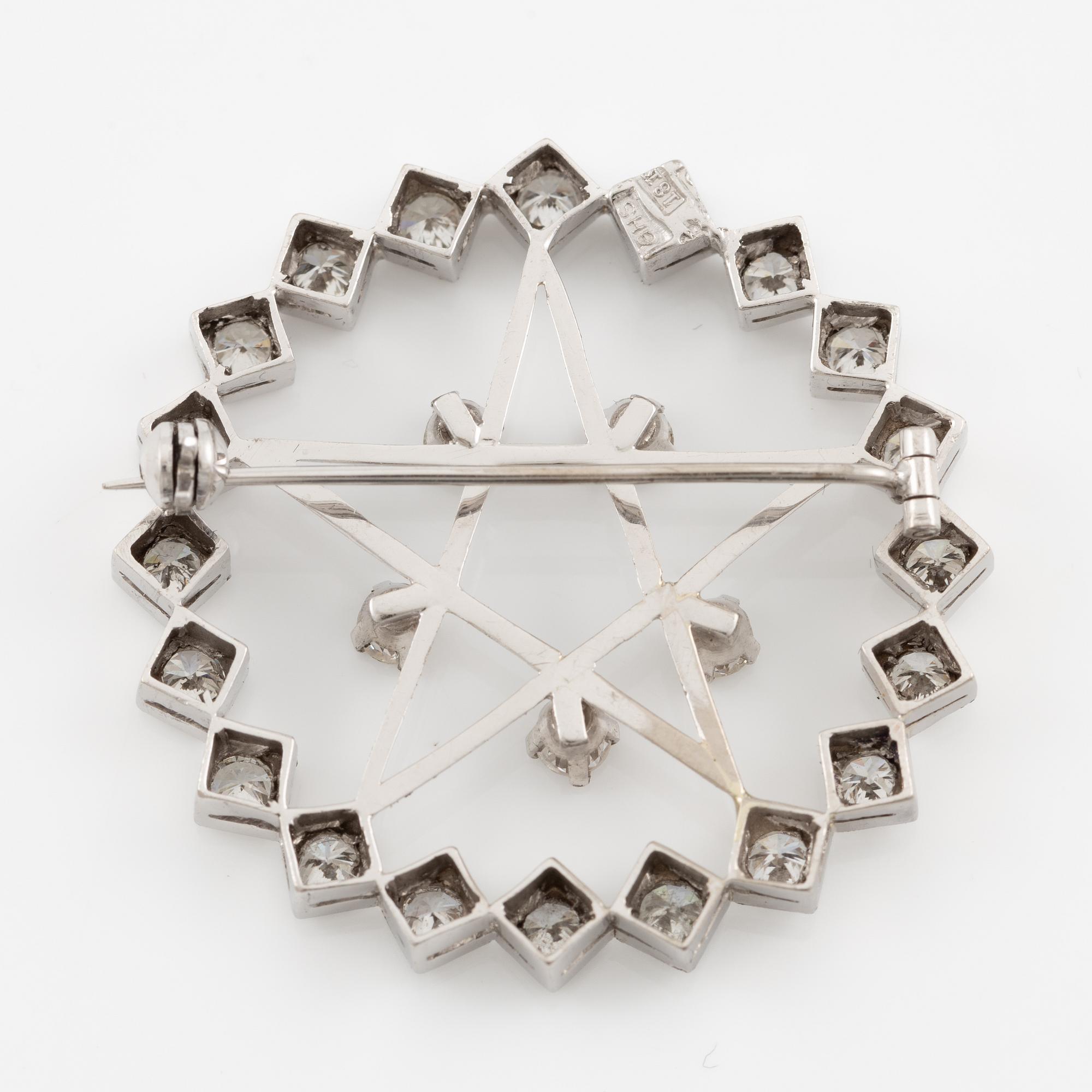 Brooch 18K white gold with brilliant-cut diamonds.