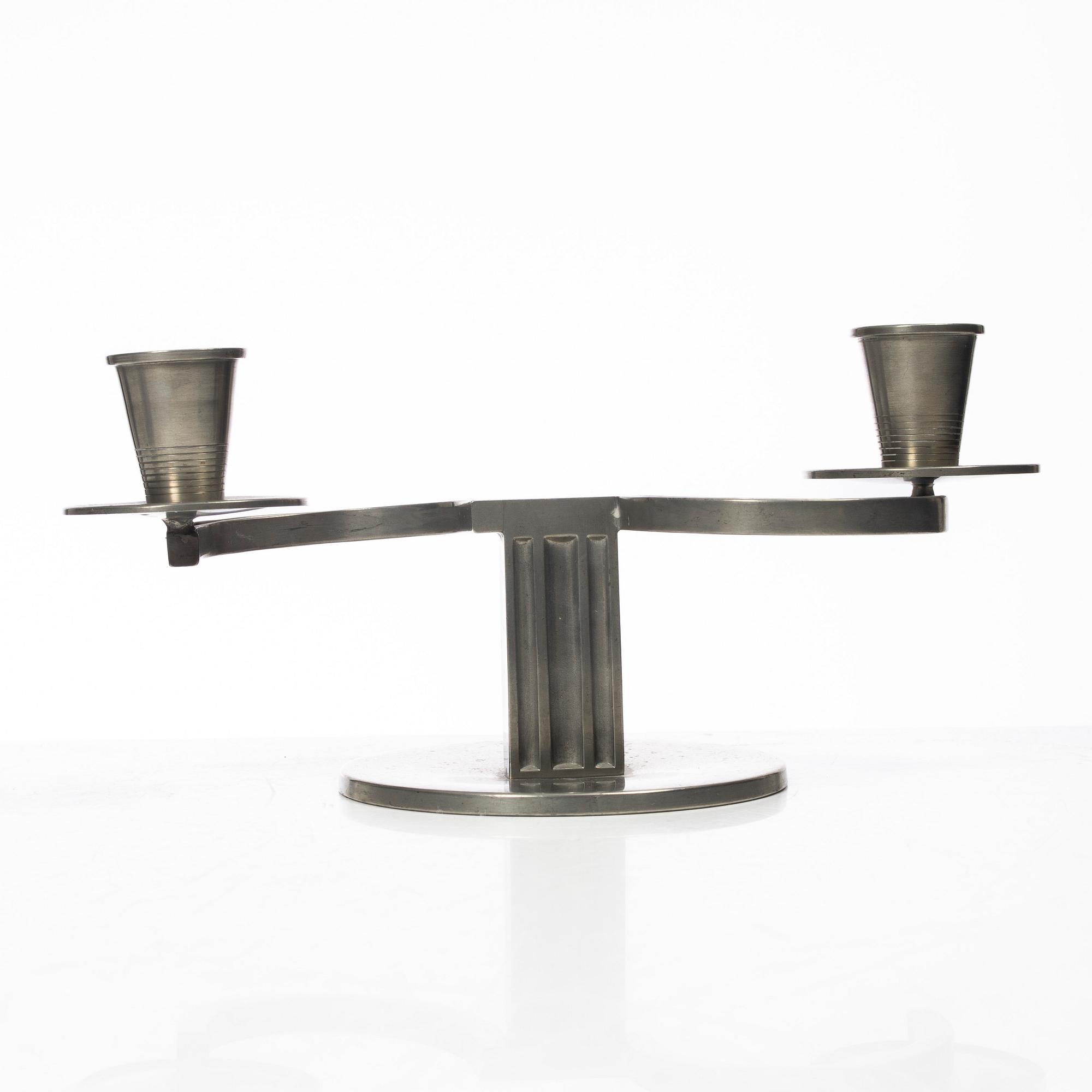 Nils Fougstedt, A pair of candelabra, FAK (Fabriksaktiebolaget Kronsilver), Stockholm, 1934.
