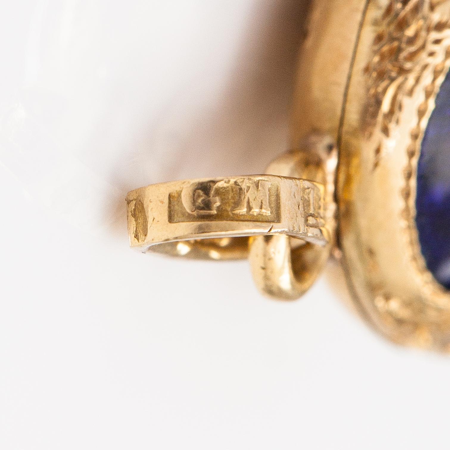 An 18K gold and silver pendant with enamel and rose-cut diamonds. Gustaf Möllenborg, Stockholm 1810.