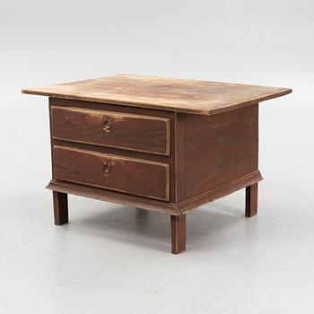 A painted table with drawers, 19th Century.