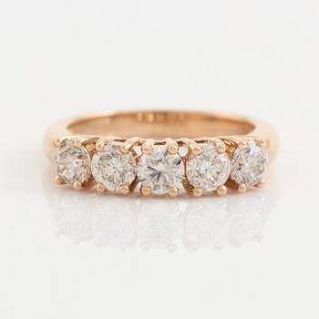 Brilliant cut diamond five stone ring.