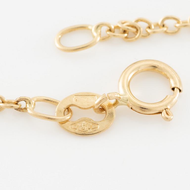 Necklace 18K gold with drop-shaped diamond.