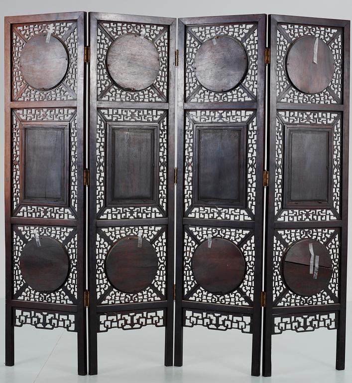 A four panel screen with porcelain placques, Qing dynasty, 19th Century.
