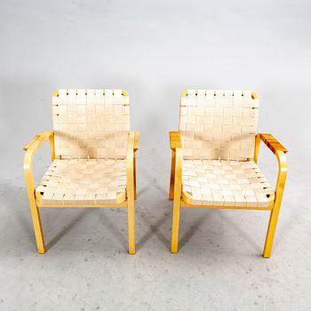 A set of two Alvar Aalto armchairs model 68, later part of the 20th century.