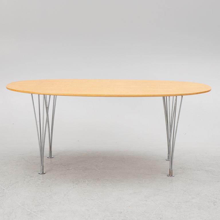 Bruno Mathsson & Piet Hein, a dining table/desk, 'Superellipse', Mathsson International, Värnamo, 1980s.