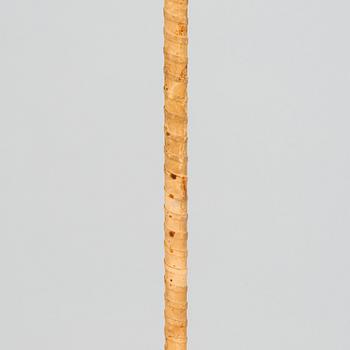 Lisa Johansson-Pape, Lattiavalaisin, Stockmann-Orno, 1900-luvun puoliväli. Korkeus 188 cm.