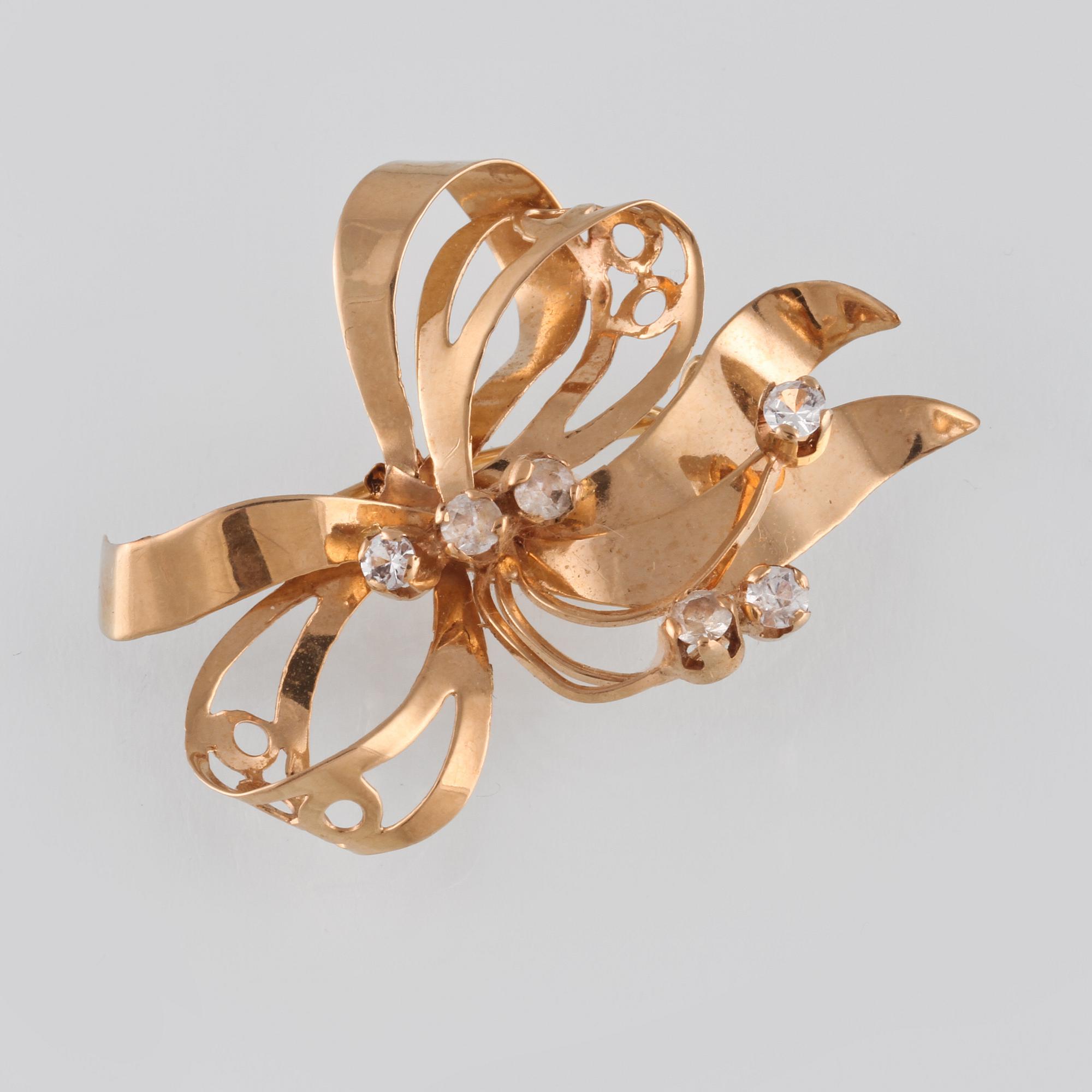 BROSCH, 18K guld med 6 fasettslipade bergkristaller, Juvelfabriken, Stockholm, 1952. Vikt 4,5 gram.
