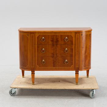 A mahogany veneered dresser, mid 20th Century.