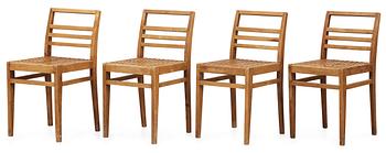 A set of four beech chairs, France 1920's-30's.