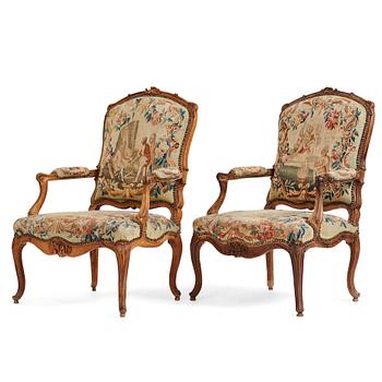 A pair of Louis XV armchairs.