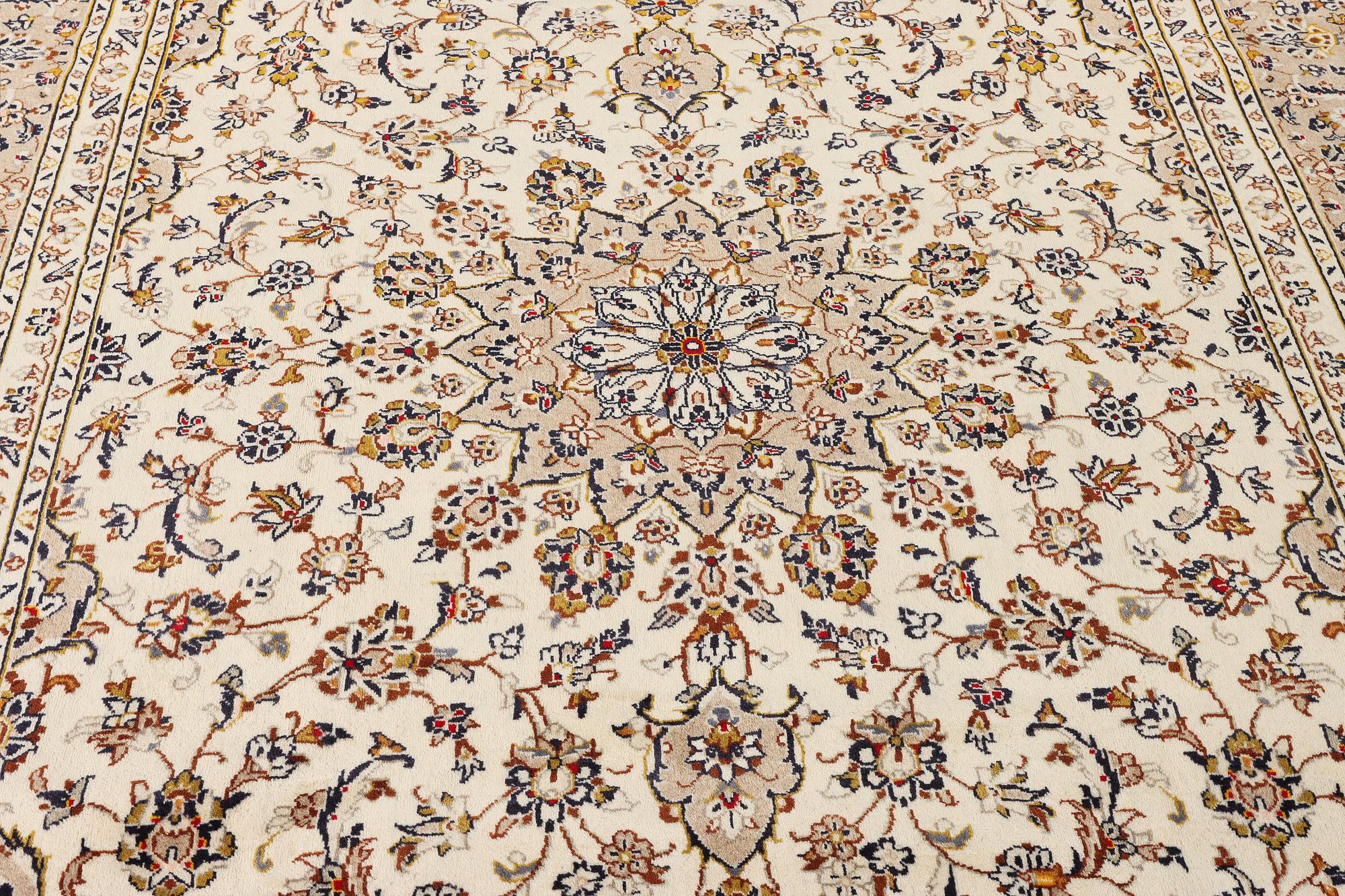 A Keshan carpet, c. 355 x 240 cm.